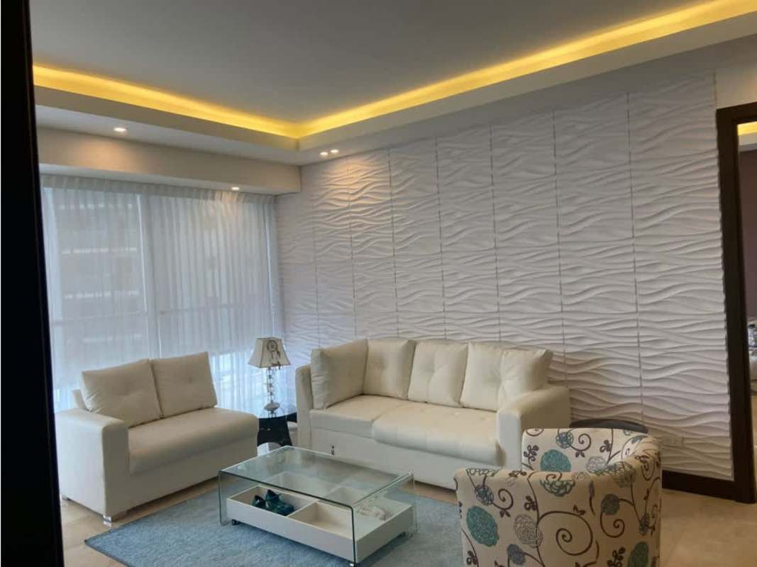 Contemporary bathroom featuring glass-enclosed shower and marble vanity JW Marriott Panama