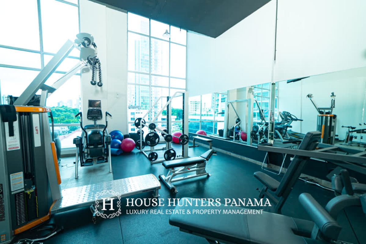 Modern bathroom with glass shower enclosure and floating vanity in PH Quartier 74 San Francisco Panama