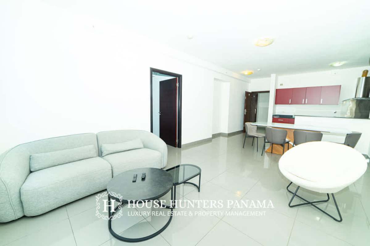 Spacious living room with modern furniture large windows at PH Quartier 74 San Francisco Panama