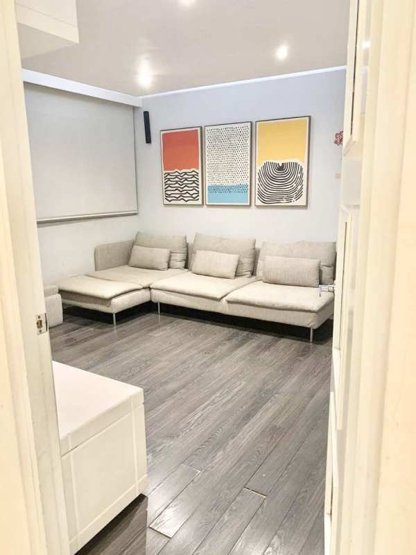 Open-plan living and dining with elegant furnishings, balcony access in Punta Pacifica Panama