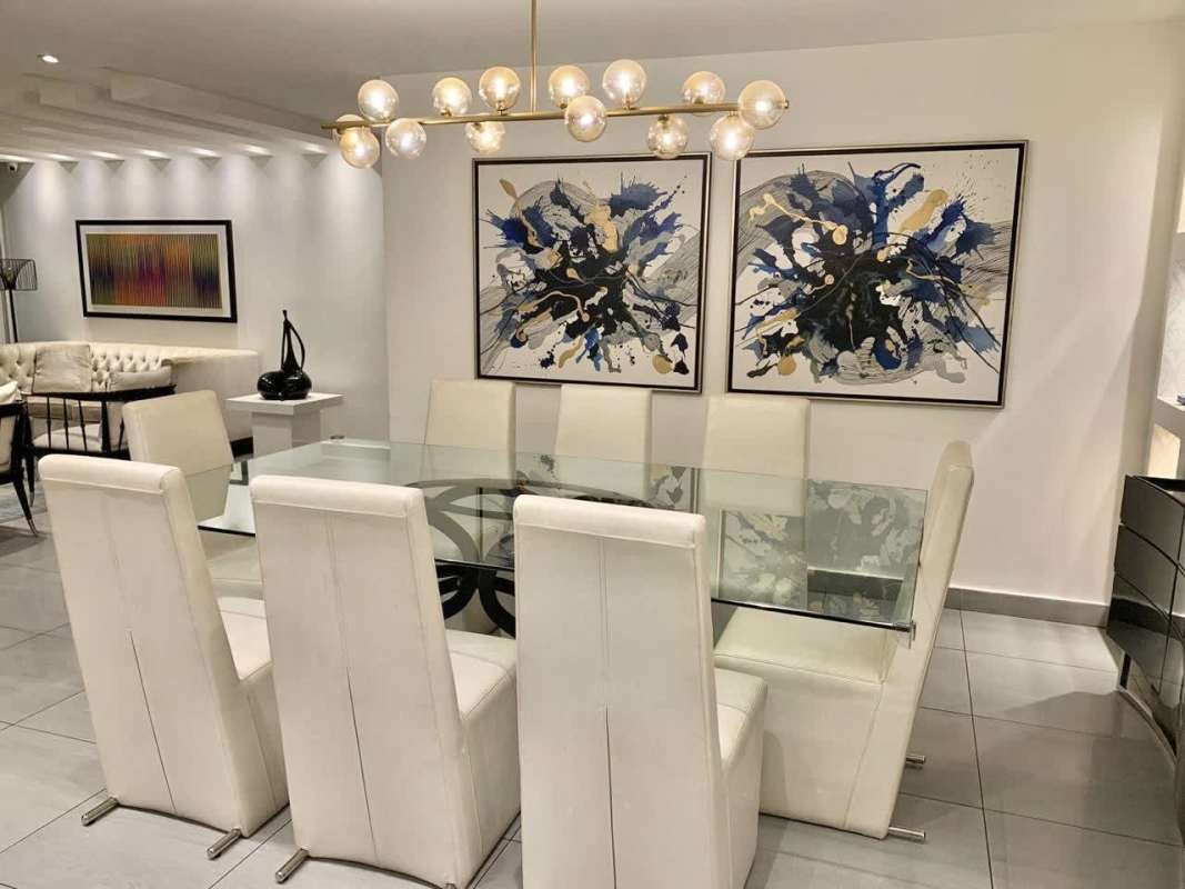 Modern living space with large windows, balcony access and stylish decor in PH Pacific Point Panama