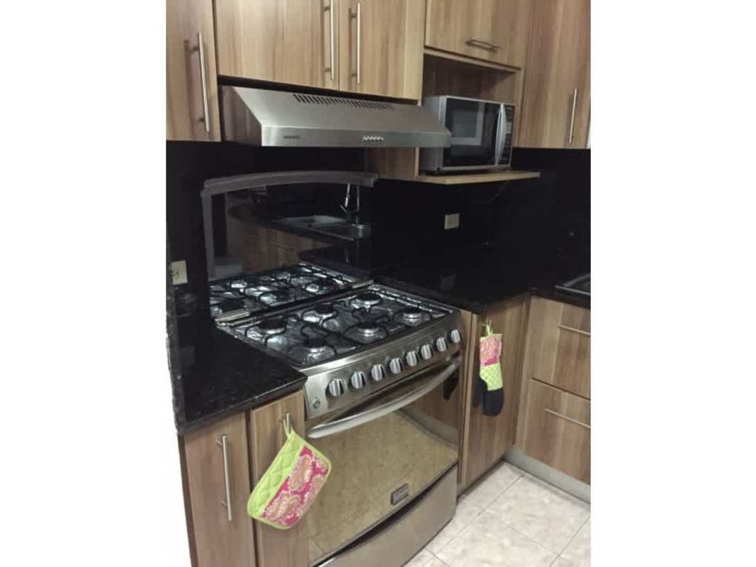 Minimalistic bedroom with large wardrobes, ceiling fan, Camino Real Betania Panama