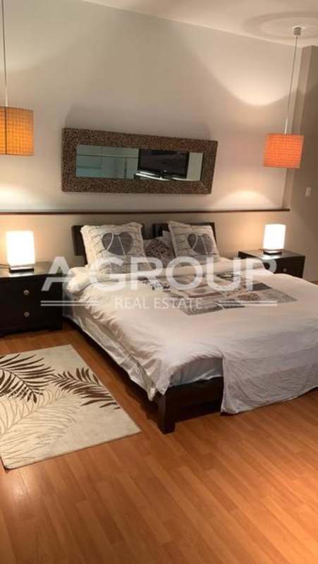 Bedroom with city views, modern decor and built-in closets in PH Loft Four 41 Punta Pacífica Panama