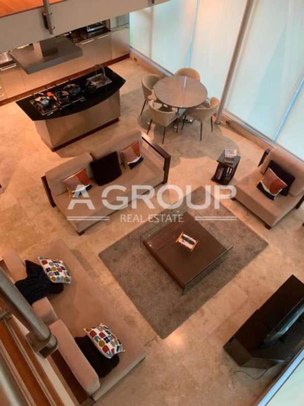 Bright dining space in loft apartment with panoramic city views in PH Loft Four 41 Punta Pacífica Panama