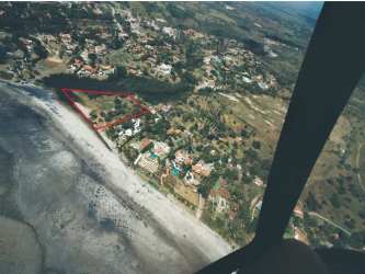 Aerial shot showing beachfront plot outline near ocean in Punta Roca San Carlos Panama