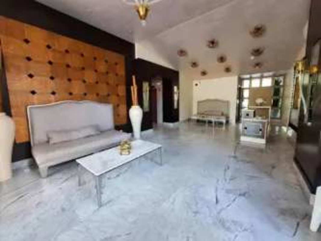 Tall luxury high-rise with glass balconies at PH Costa del Este Tower