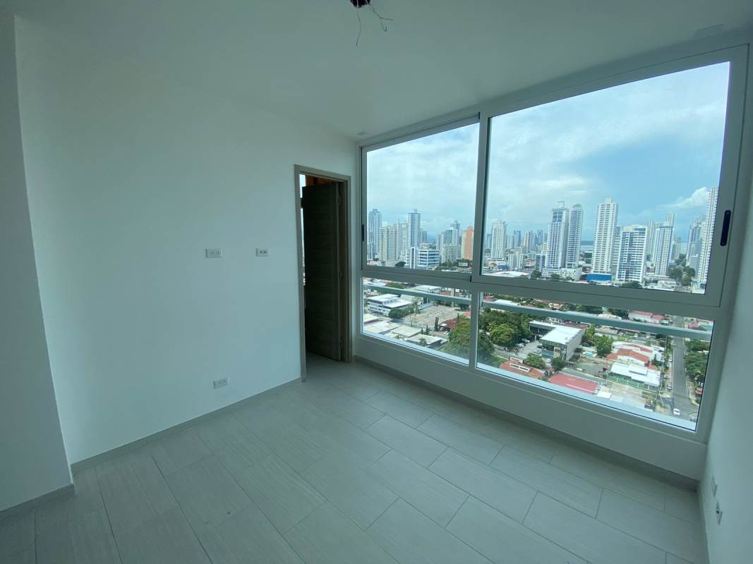 Modern bright bedroom with ocean city view in The Tower Panama Coco del Mar