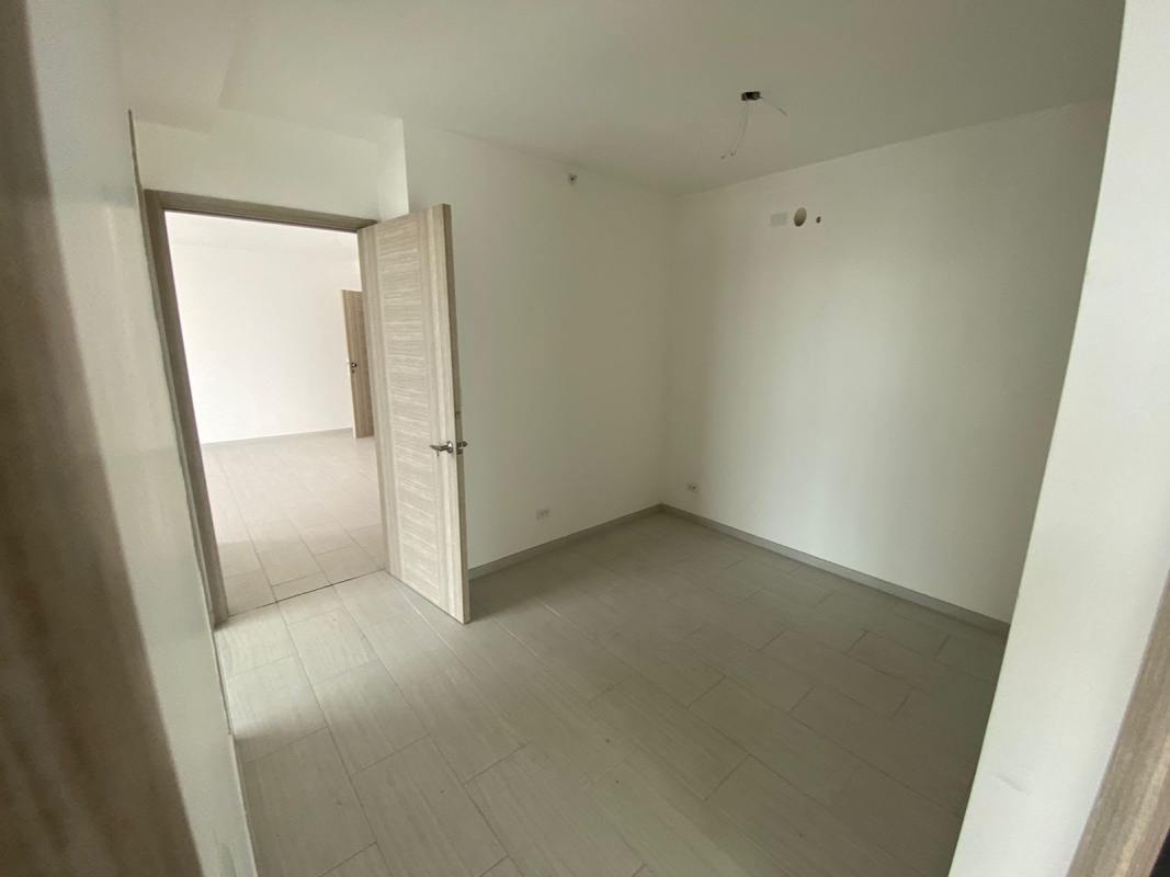 Contemporary bathroom with glass shower enclosure modern fixtures condo The Tower Panama