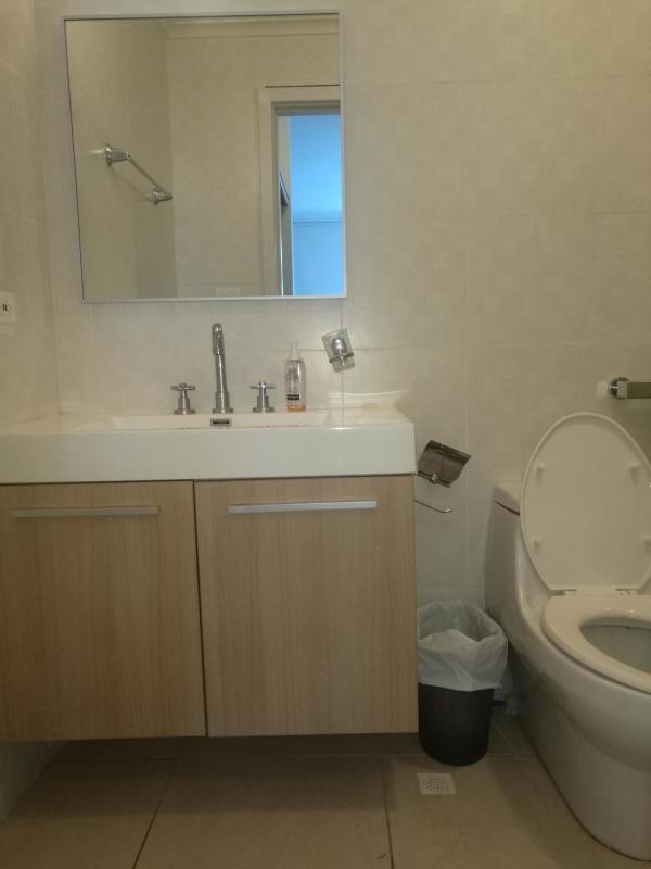 Bright living room with access to seaview balcony and city skyline Panama City