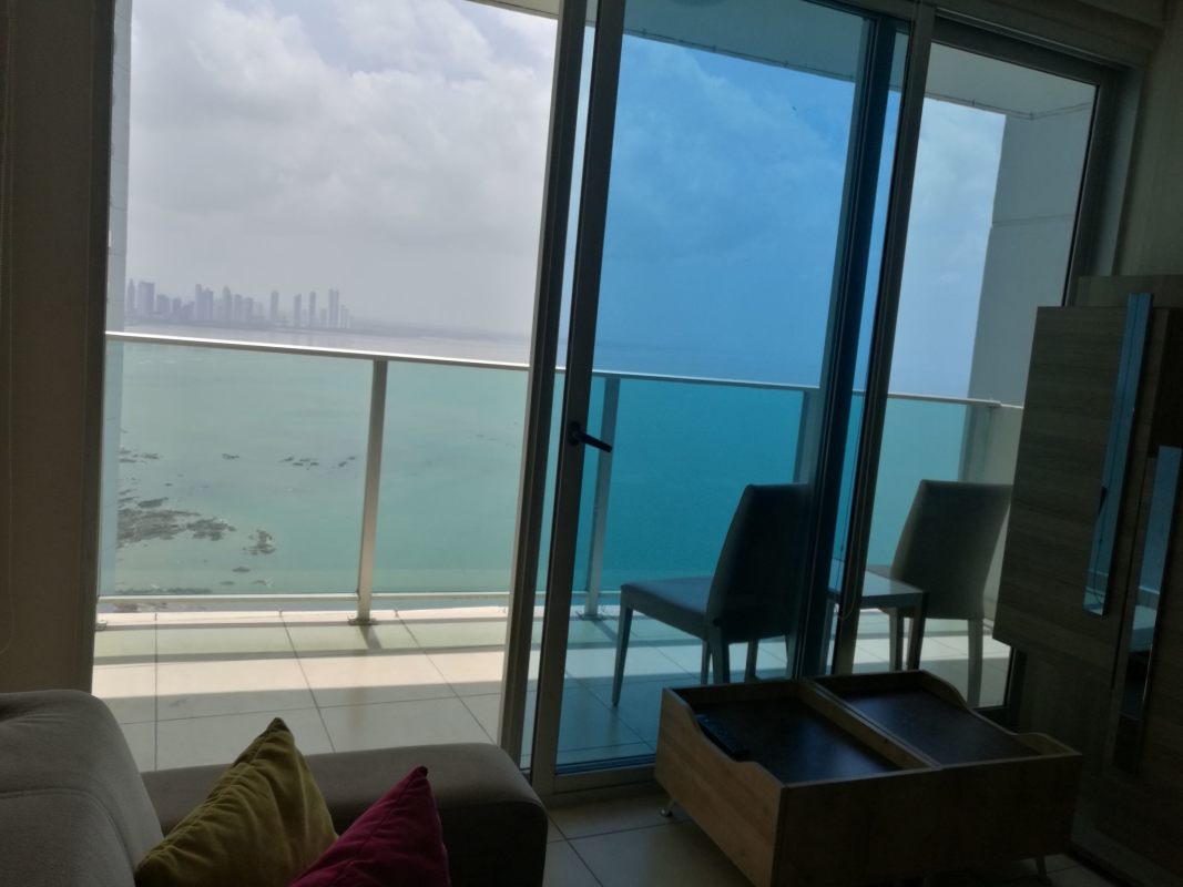 Bedroom with panoramic ocean view and large window in apartment for sale PH Pacific Point