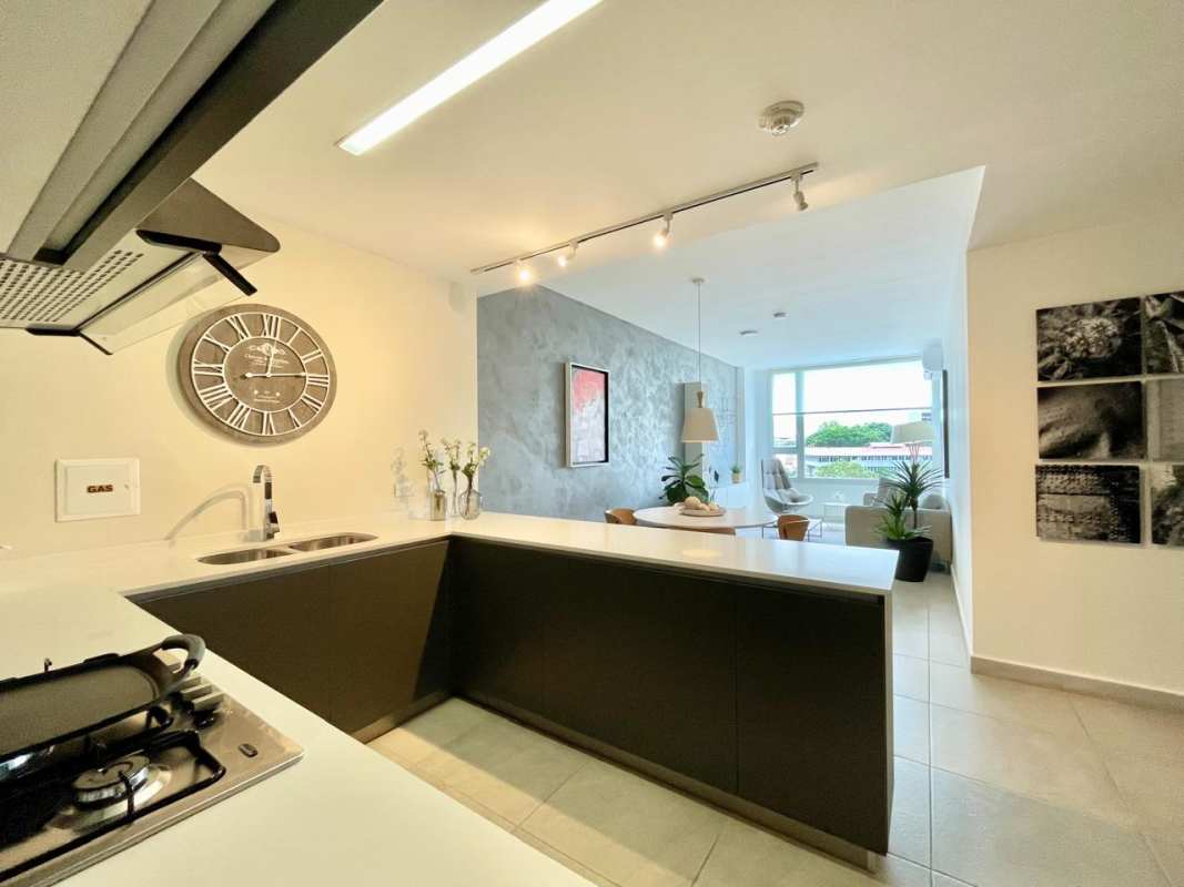 Modern open kitchen and living dining area at PH Van Gogh El Cangrejo Panama