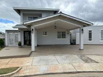 Kitchen with granite counters, modern cabinetry and pantry PH Rolling Hills Costa Verde Panama