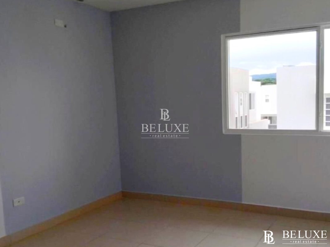 Modern minimalist bedroom with large window in PH Augusta Brisas del Golf Panama