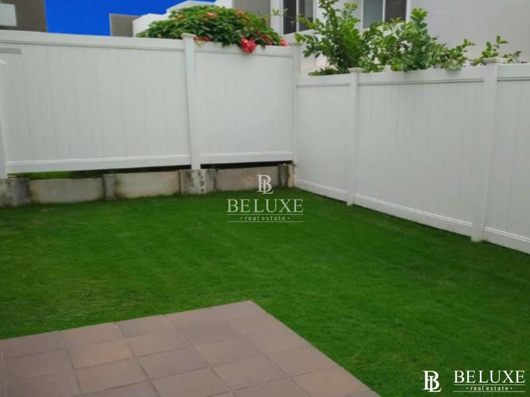 Fenced yard, green grass and patio PH Augusta Panama
