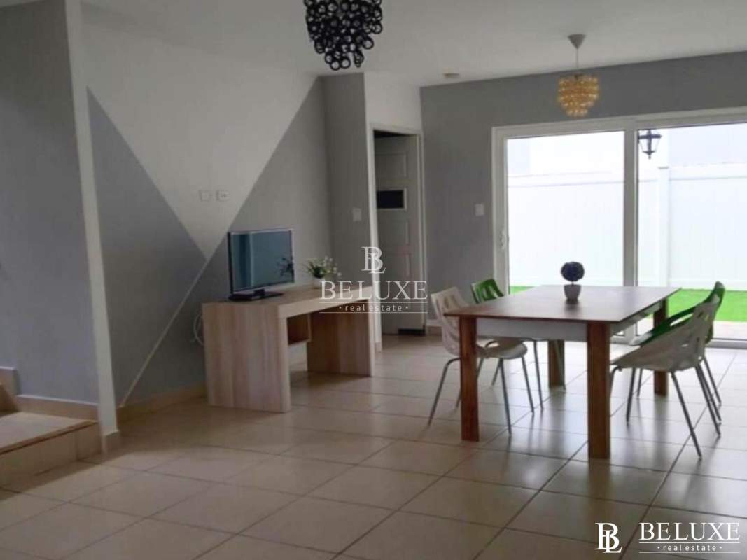 Contemporary bathroom glass shower enclosure orange tile strip in PH Augusta Panama