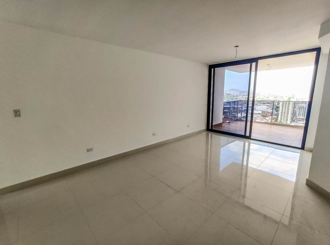 Laundry room with large window, utility sink, and tiled walls PH Carreras Tower El Cangrejo Panama