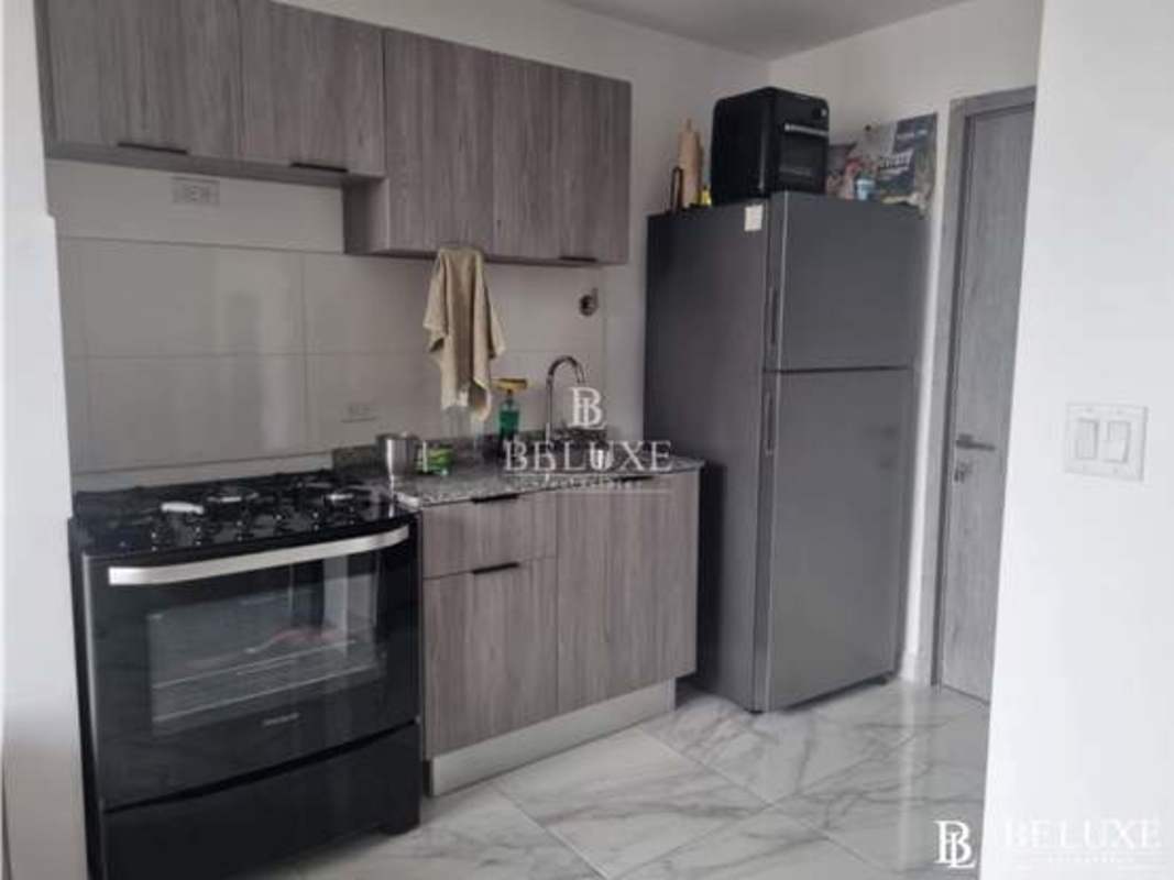 Fully equipped indoor gym with panoramic skyline views in PH The Gray Calle 50 Panama City