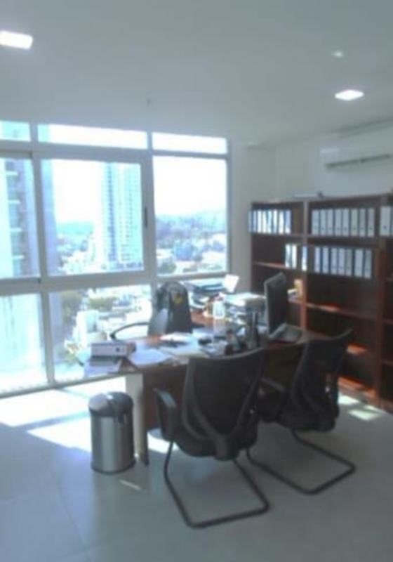Modern office conference room with glass partitions and city view in PH Los Colores Bella Vista, Panama City