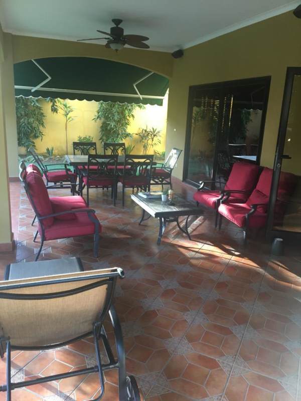 Large open kitchen island, granite counters, wood cabinets, stainless appliances in La Antigua Costa del Este