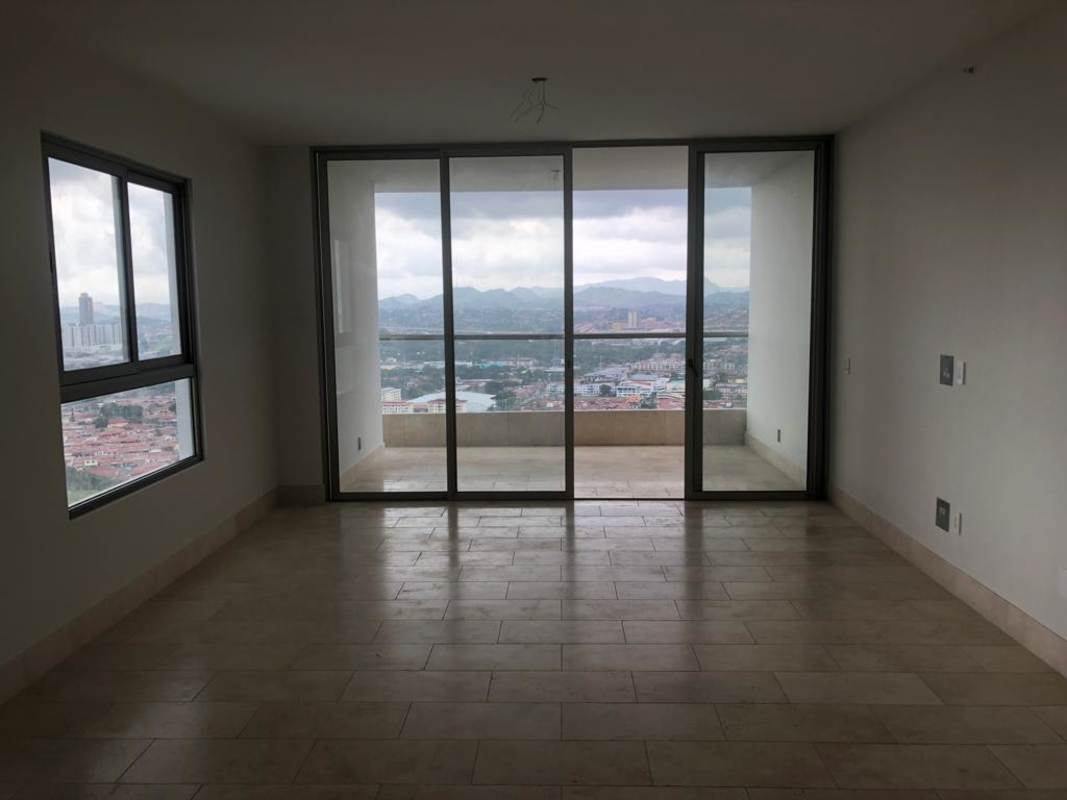 Open-plan living and dining area with balcony city view PH Green View Santa María Panama