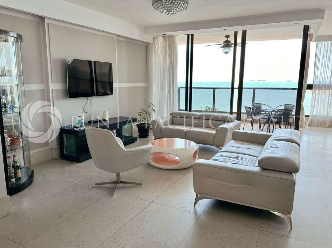 Elegant lobby at PH San Francisco Bay with marble floors, art wall and comfortable seating in Panama City Panama