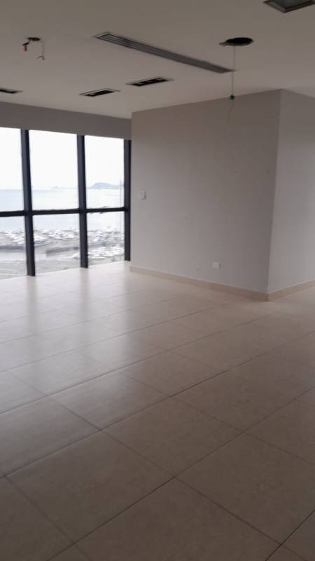 Reception area with modern finishes inside full floor corporate office PH Torre BAC in Marbella, Panama