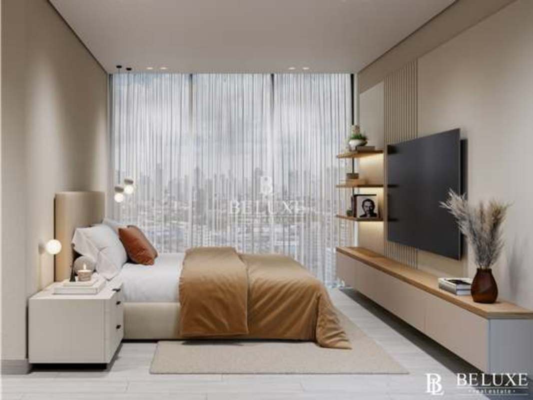 Open plan smart living room with floor to ceiling windows at PH Aura Panama City