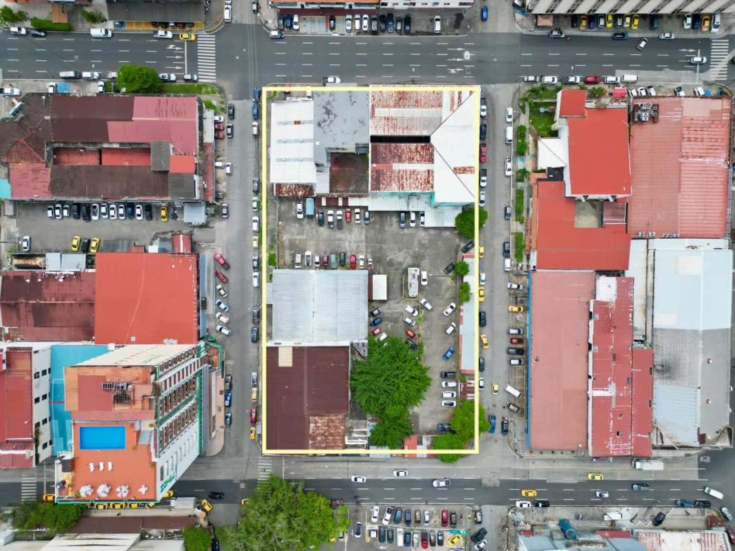 Aerial view Panama City outlined block development site with parking and urban streets