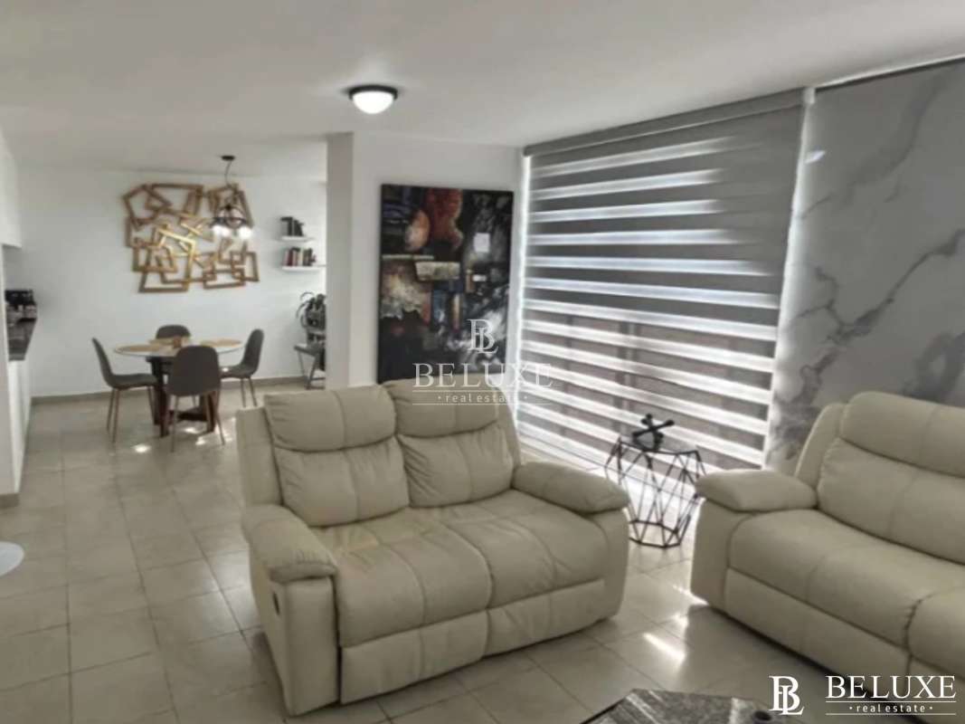 Contemporary kitchen with granite counters, stainless appliances in PH Cosmopolitan Towers Panama City