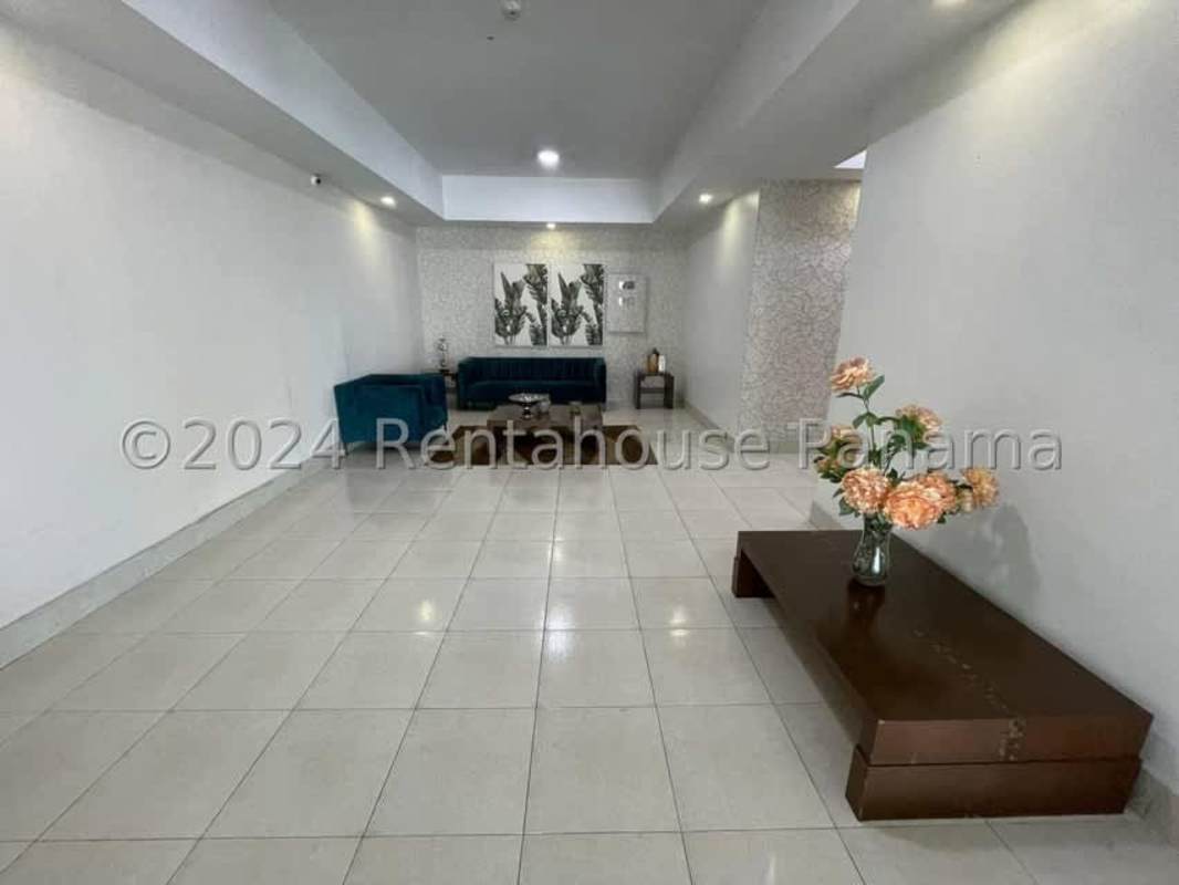 Contemporary tiled bathroom with glass enclosed shower and pedestal sink in PH Majestic Gardens Panama