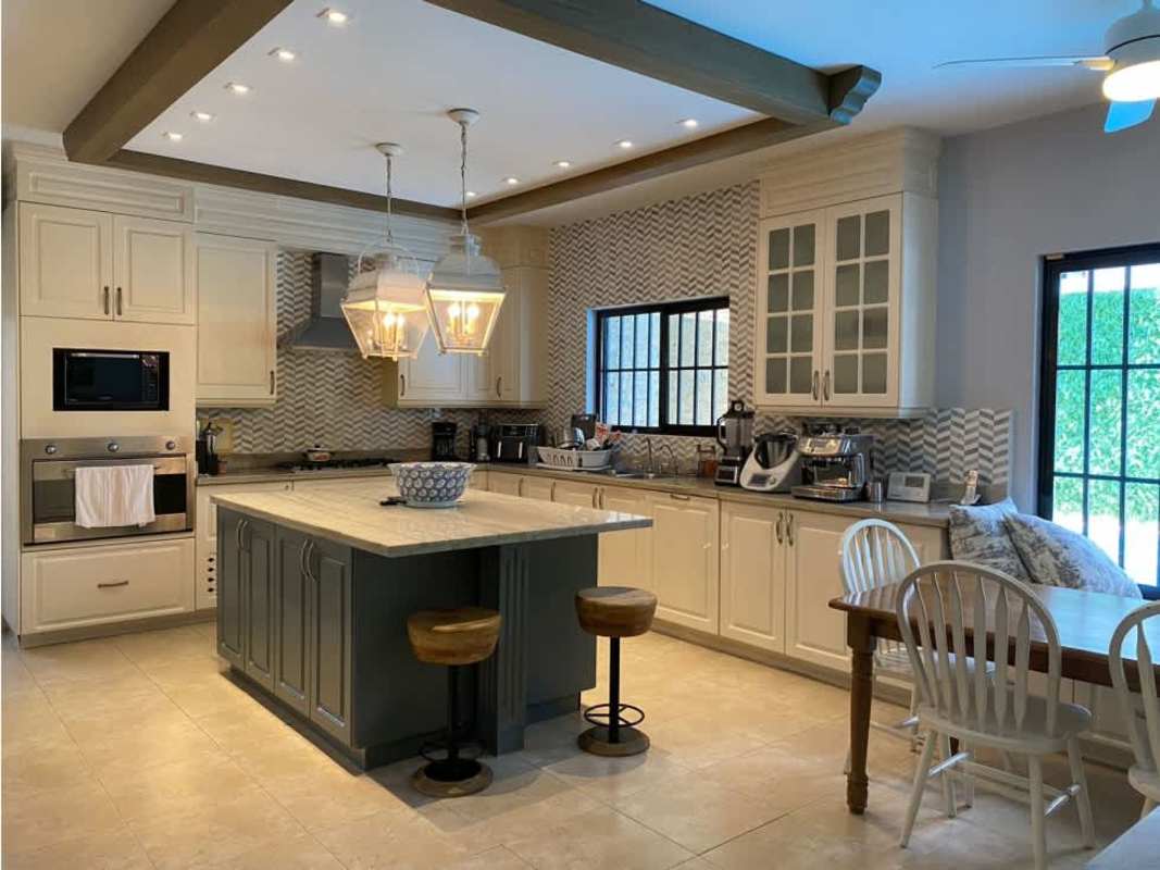 Dining space with garden views and large windows in Antigua luxury house for sale Panama