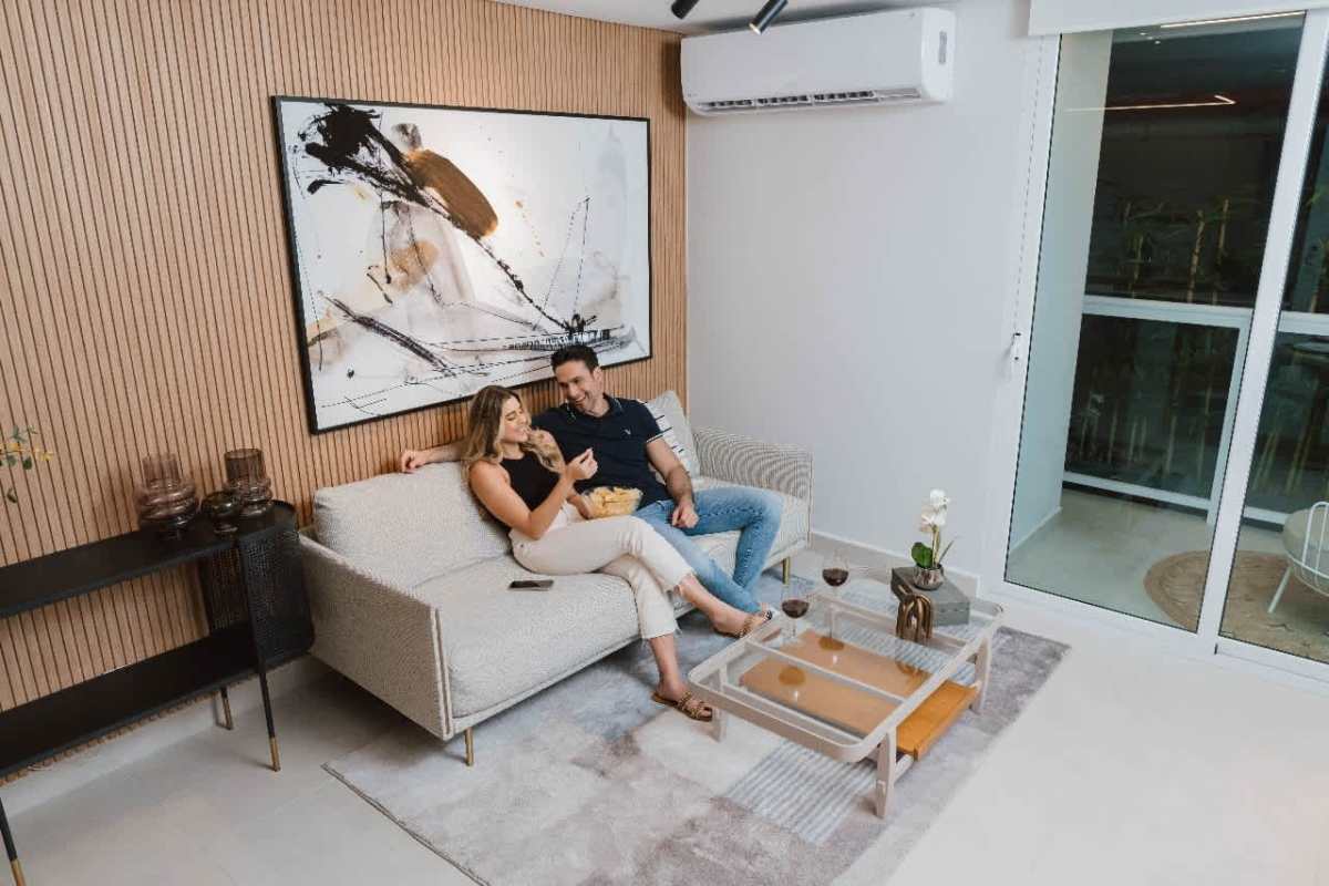 Modern living room with sliding doors leading to balcony in PH Mi Condado Panama