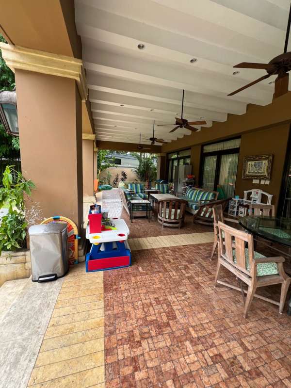Formal dining space with elegant chandelier seating for 16 luxury mansion in Panama