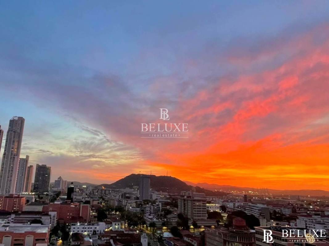 Modern bright bedroom with ocean view large windows at PH Balboa Bay Bella Vista Panama