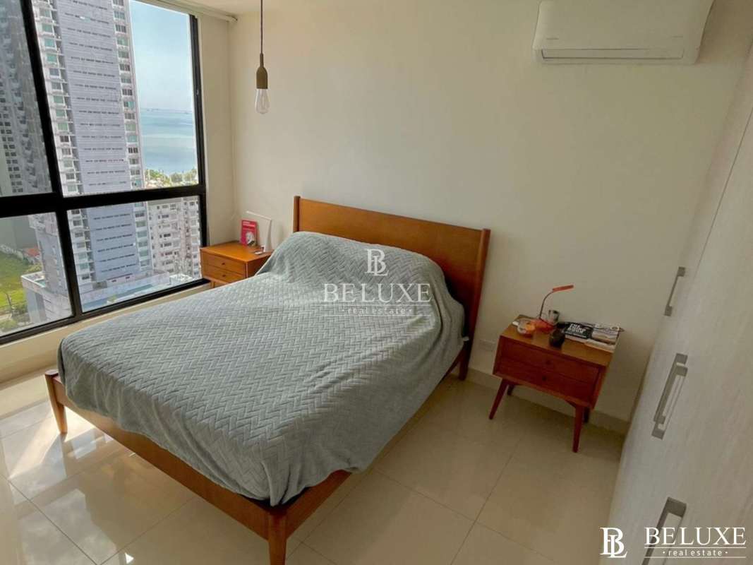 Open plan living dining area large windows panoramic ocean and skyline view PH Balboa Bay