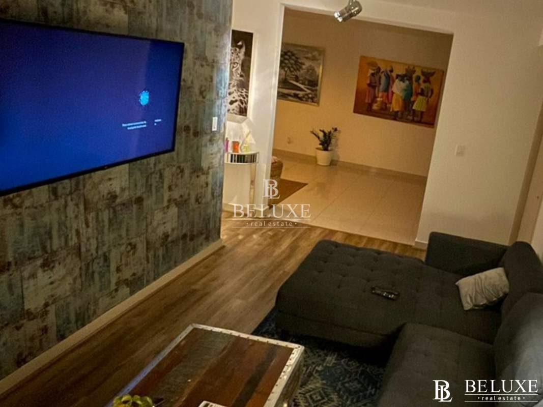 Bedroom featuring large window city skyline view minimalist style PH Balboa Bay Bella Vista Panama