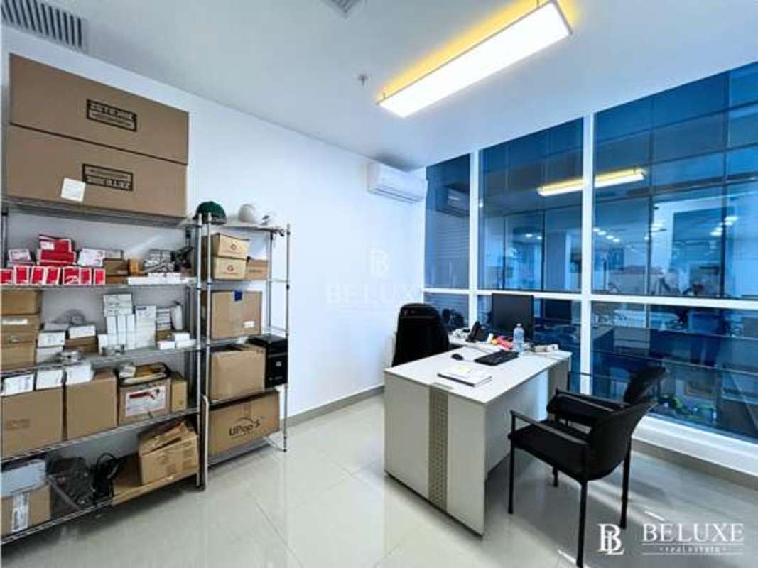 Compact kitchenette area with granite counters in Edison Corporate Center Panama