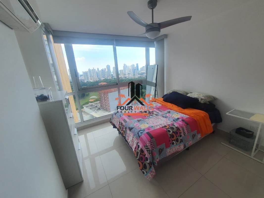 Modern master bedroom with large windows, AC, and en-suite bath at PH Park Point Panama