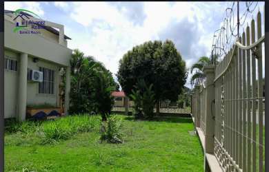Covered balcony overlooking garden ideal for relaxing at home in David Chiriquí Panama