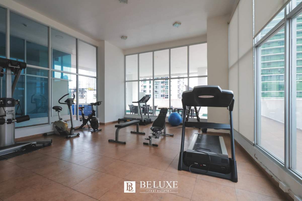 Bright indoor gym with skyline views PH Marina Park Panama City for residents
