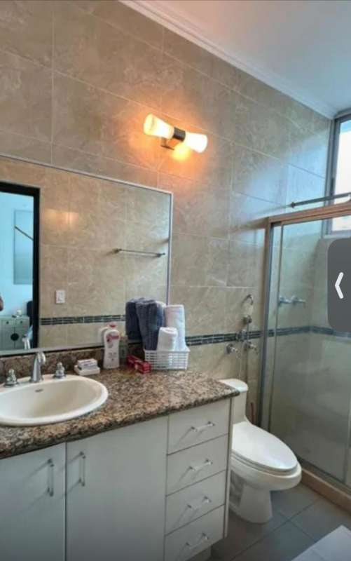 Contemporary bathroom vanity marble wall tiles organized accessories PH Marina Park Panama