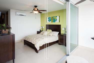 Master bedroom with balcony access and ocean view Bahia Playa Serena Gorgona Panama