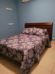 Modern bathroom with granite double sink and walk-in shower Bahia Playa Serena