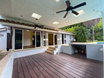 Covered deck patio with ceiling fans outdoor kitchen pergola near Coronado Panama