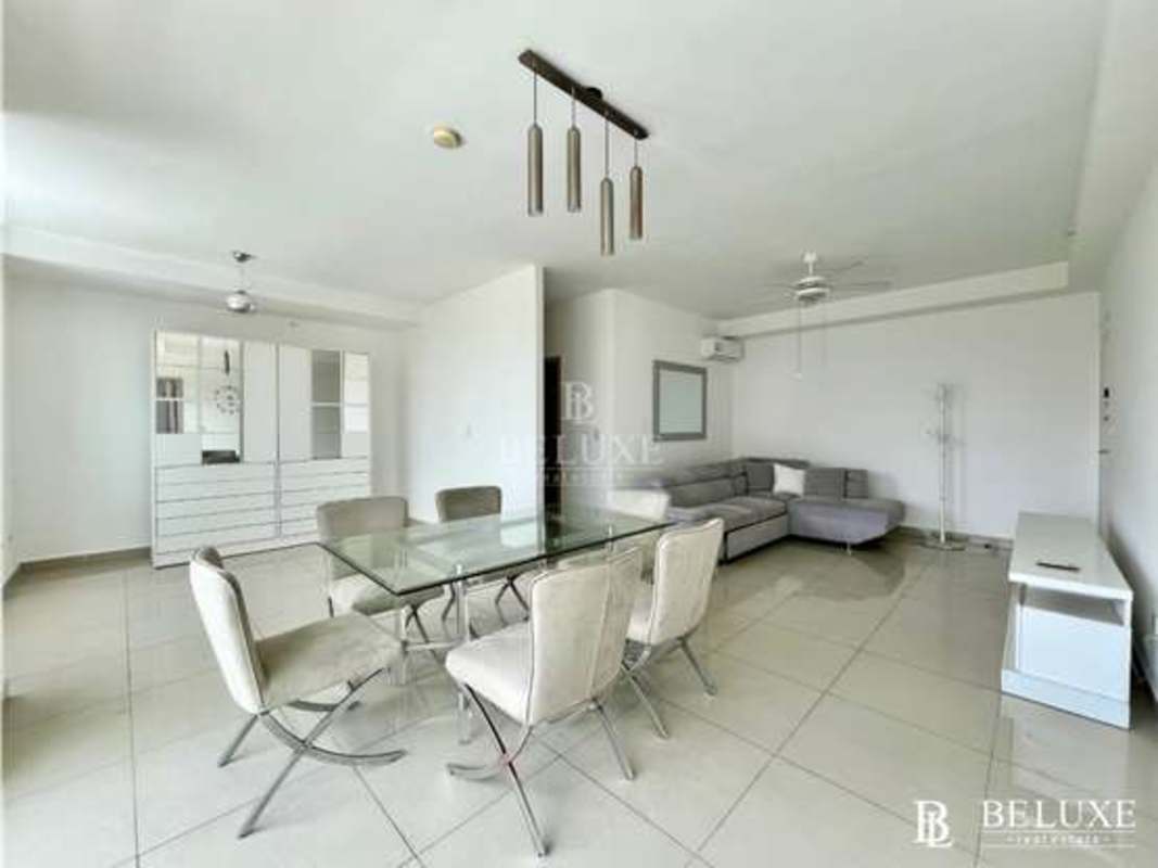 Spacious open-plan living dining area with access to balcony in PH Firenze San Francisco Panama