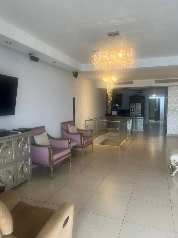 Spacious penthouse living room with marble floors, chandeliers, balcony, Pacific Ocean view in PH Rivage Tower