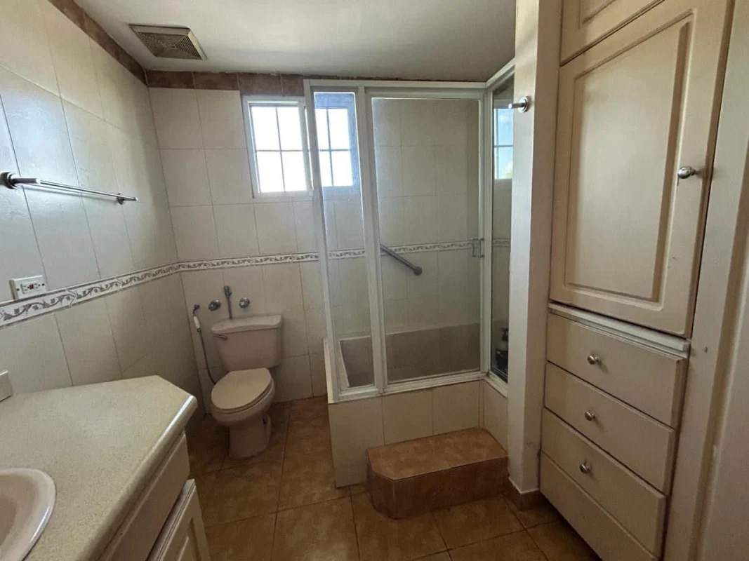 Open concept living dining sliding glass doors overlooking patio terrace Villa Zaita house Panama