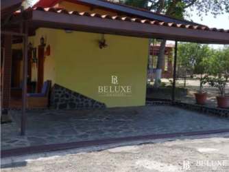 Traditional patio with tiles, fountain, solar panels in Playa El Higo estate Panama