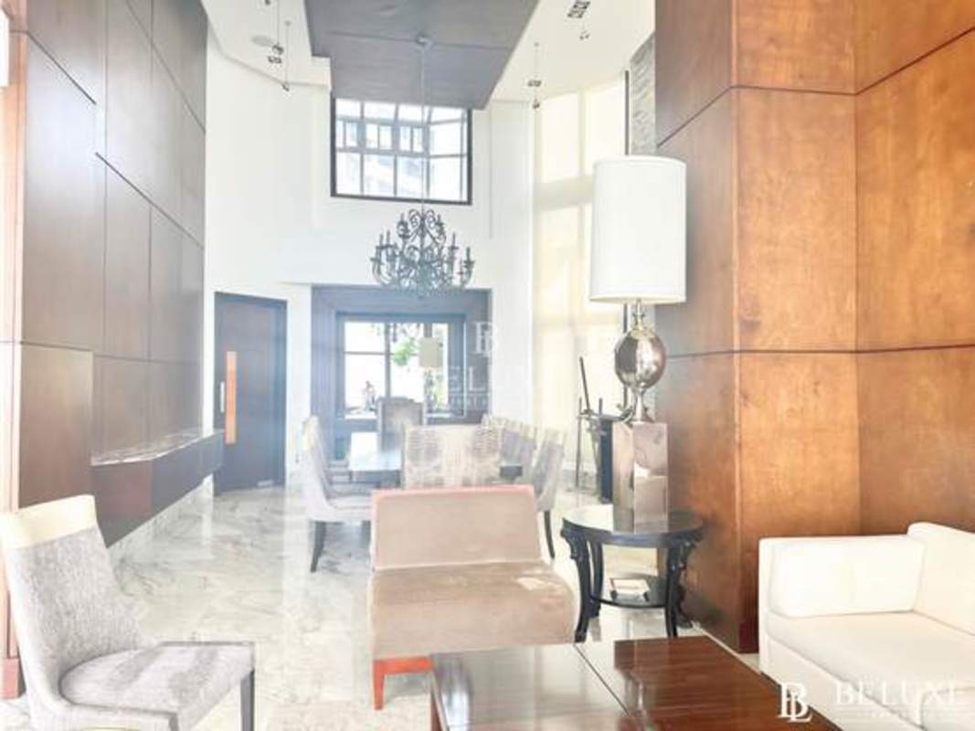 Balcony with glass railing and ocean views from PH Regent penthouse, Punta Paitilla Panama City