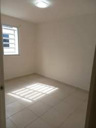 Empty bedroom with tiled floors, built-in closet and natural light Playa Dorada Panama